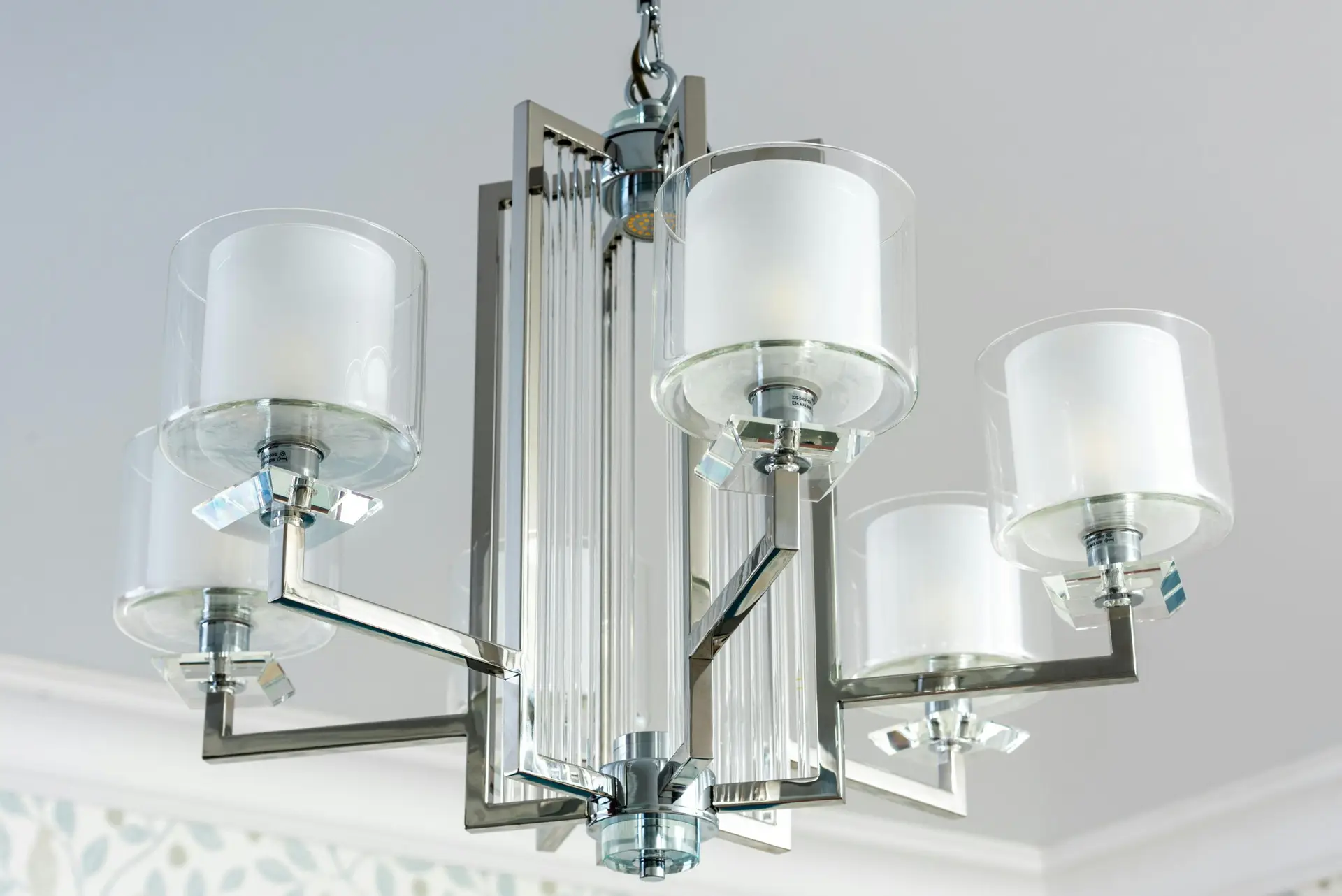 Low angle of creative design of lamp made of glass and metal materials in house room